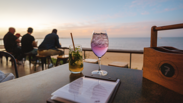 Sip into sunset at Enzo’s on the Beach