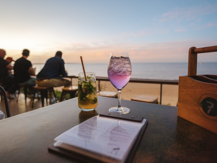 Sip into sunset at Enzo’s on the Beach