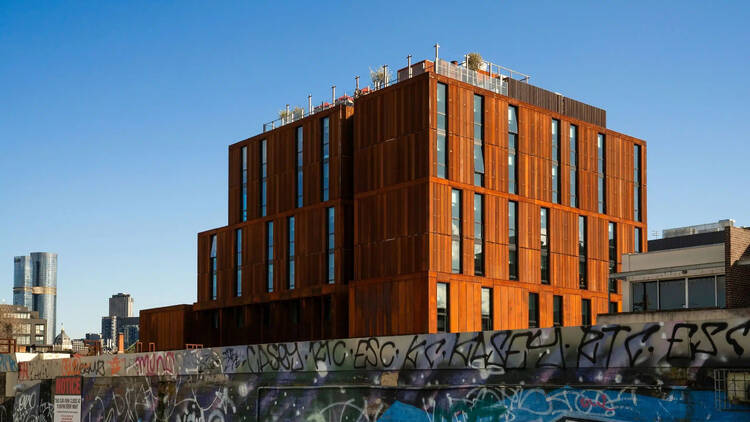 The exterior of a timber framed hotel. 