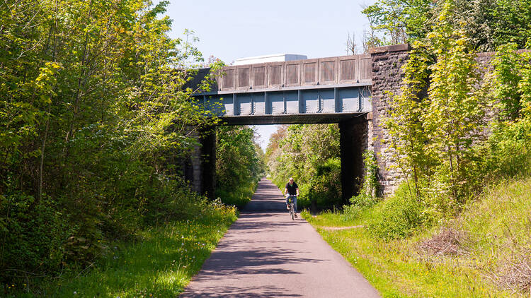 A cyclist on a cycle path in Bristol, England