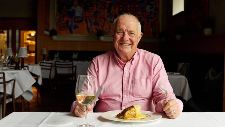 Rick Stein eating in a restaurant 