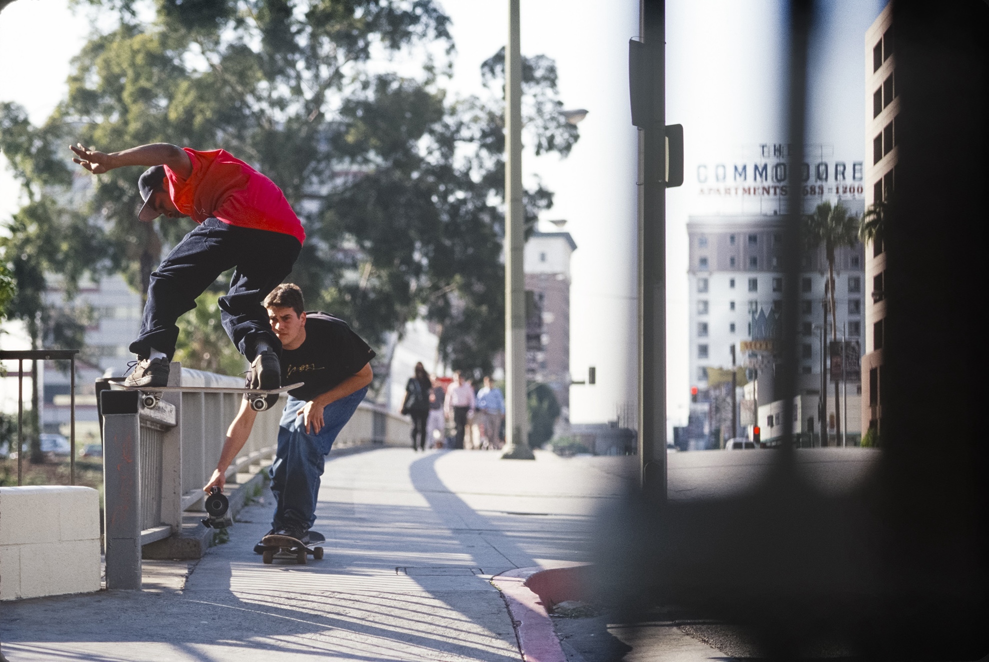 A skateboarder on a railing.