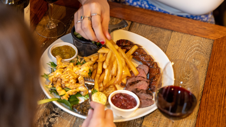 Meat with chips and wine