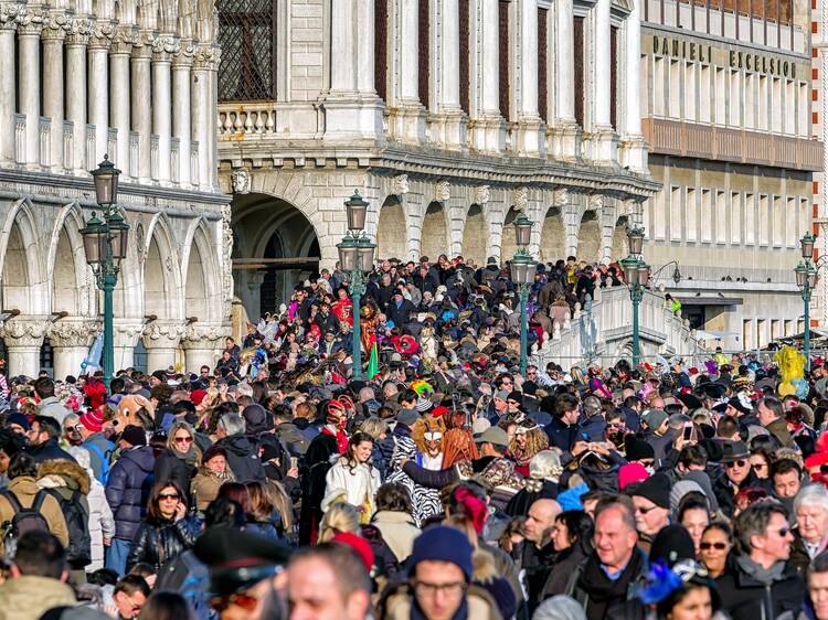 Overcrowded waterfront in Venice, Italy