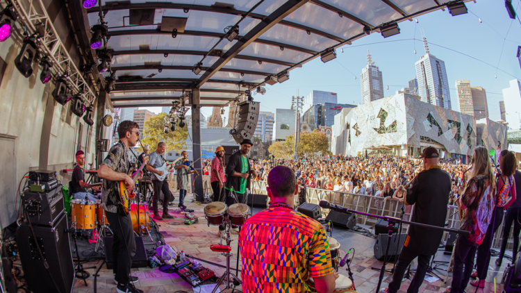 Jazz performance at Fed Square seen from the back of the stage