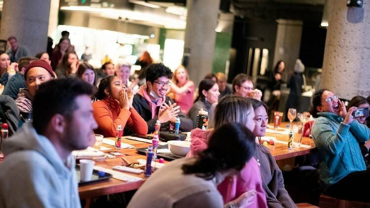 The crowd enjoys drag brunch and bingo at Time Out Market Boston