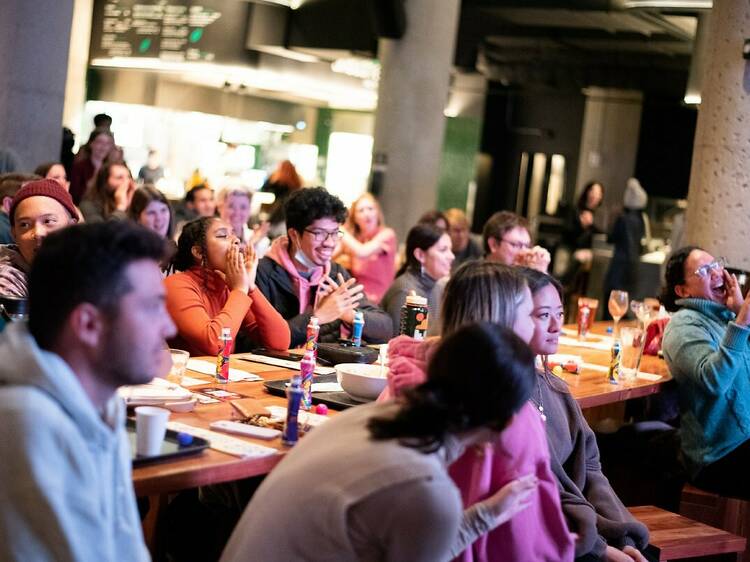 The crowd enjoys drag brunch and bingo at Time Out Market Boston