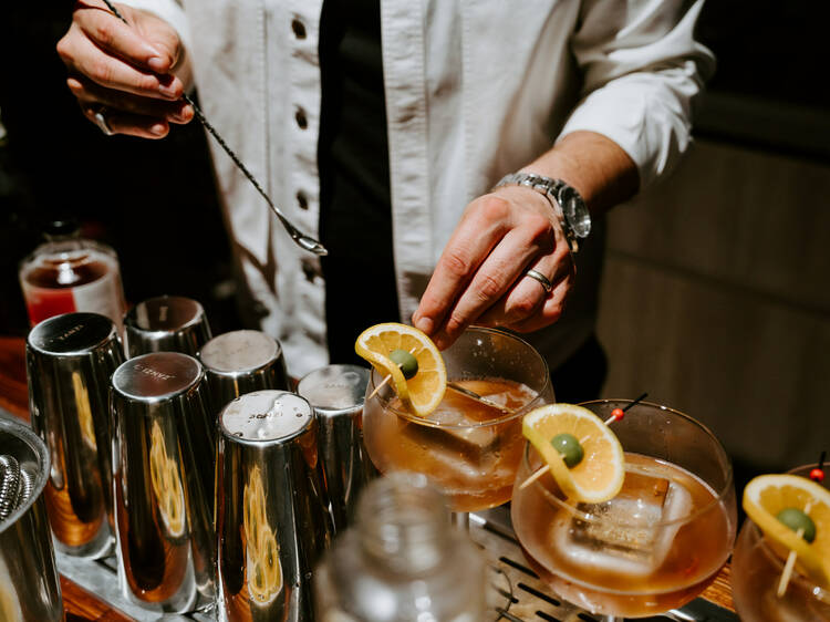 Bartender mixing cocktails.