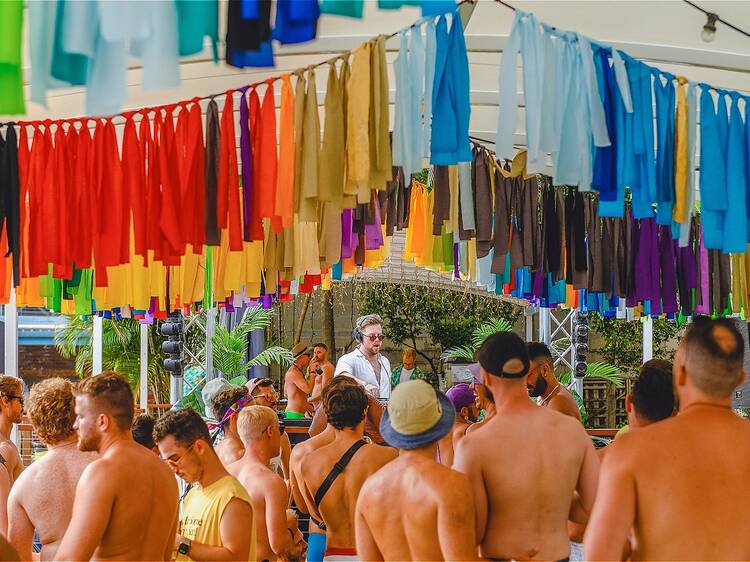 Pool party with rainbow flags