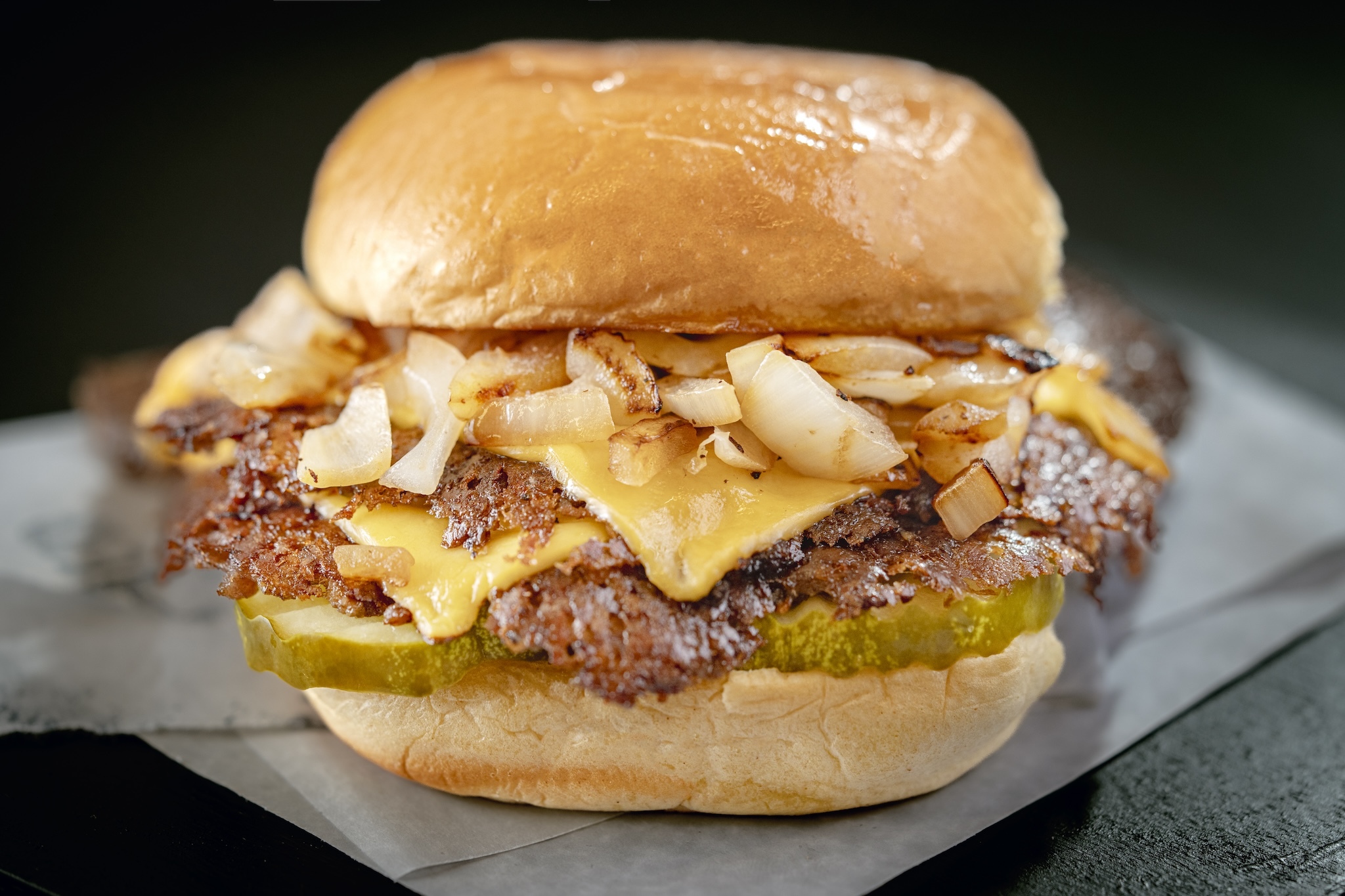 Double Classic burger with cheese, onions and a potato bun