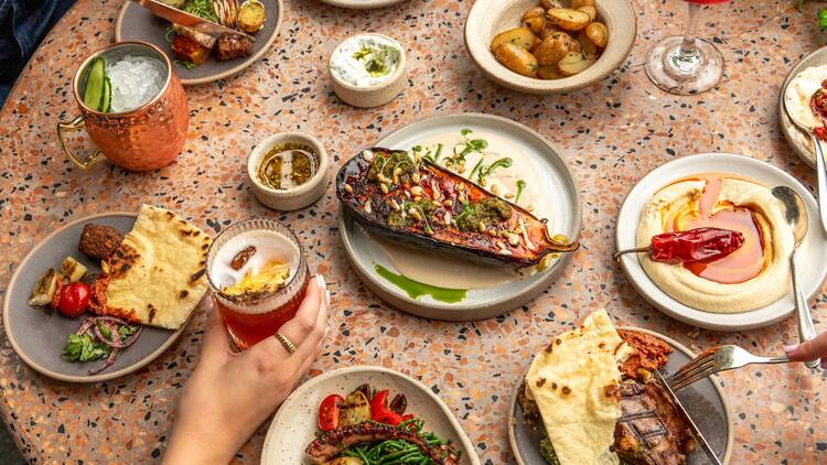 Plates of food on a table (Photograph: Courtesy of Kaso )