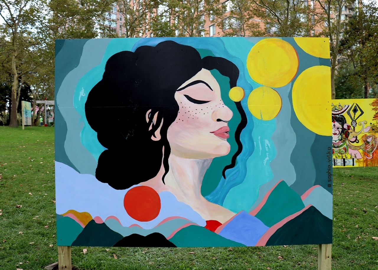 A mural of a woman's face.