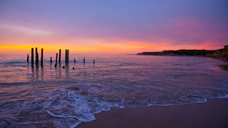 Watch the sunset from the Port Willunga Jetty Pylons