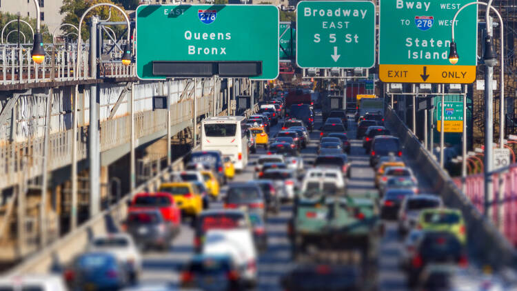 cars over a bridge in traffic