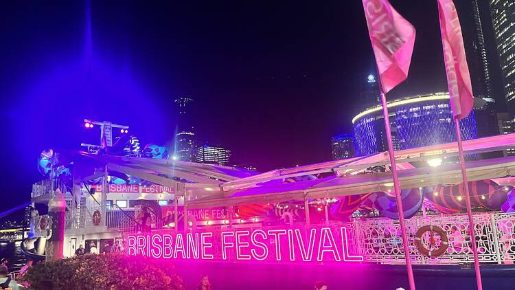 The Art Boat with neon Brisbane Festival sign