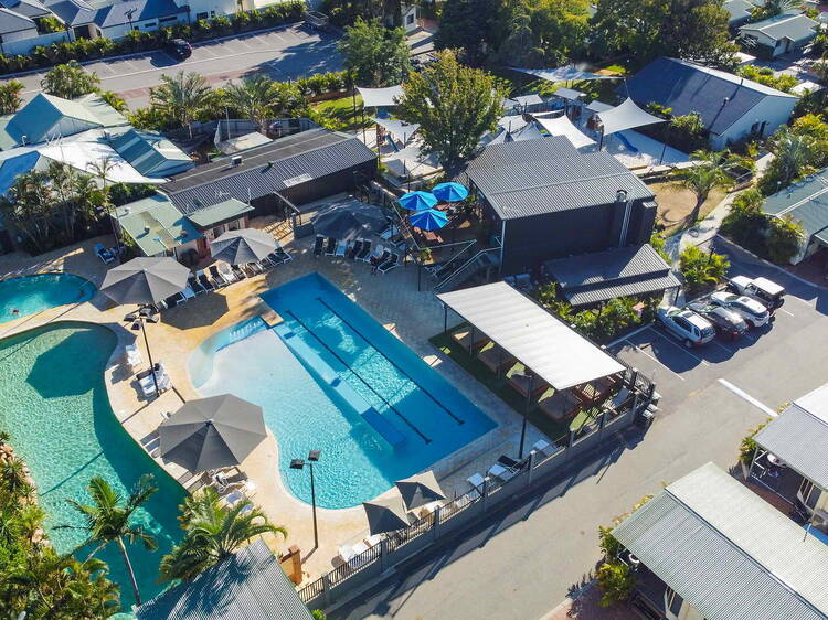 Aerial view of caravan park with pool