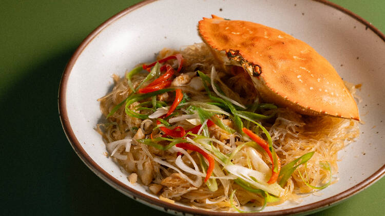 Crab glass noodle with a half shell of a crab