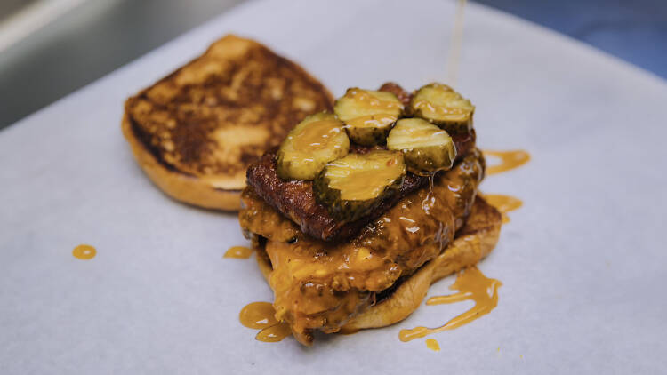 Fried chicken sandwich with pickles and hot honey