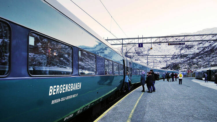 Bergensbanen train at a snowy landscape in Norway