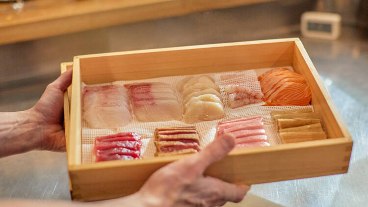 Box of sushi.