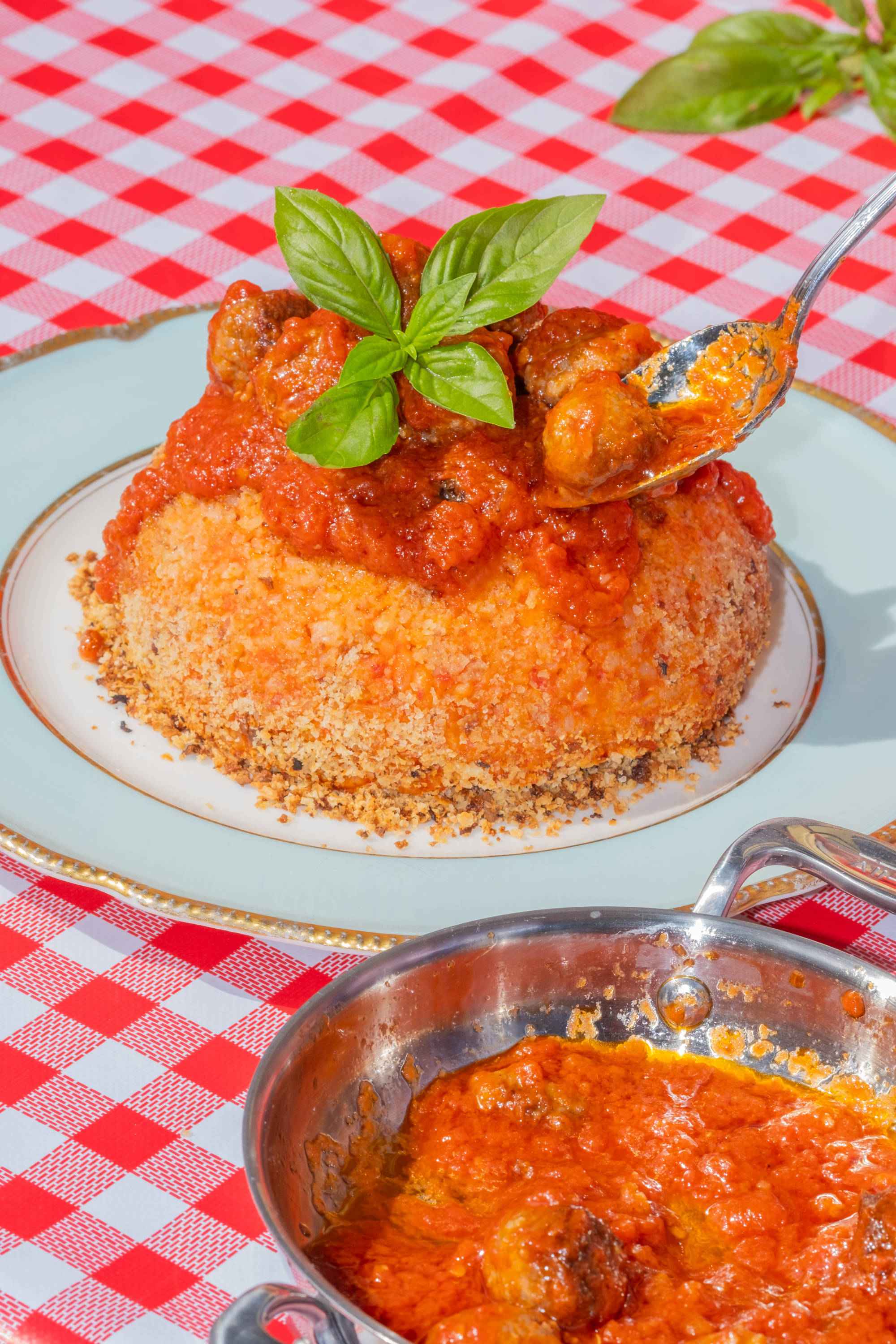 Bomba di Riso, with meatballs spooned on top