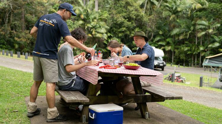 Friends enjoying a picnic outside