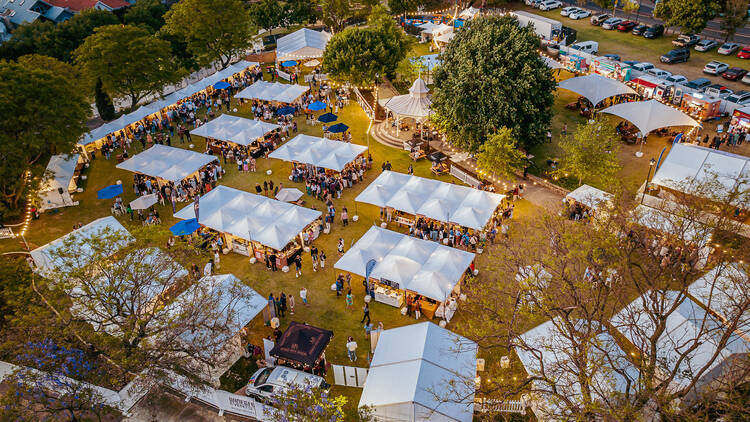 Aerial shot of food and wine festival in parkland