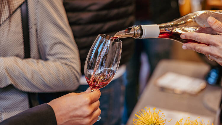 Red wine being poured into glass