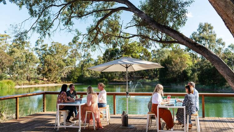 Veranda dining by lake