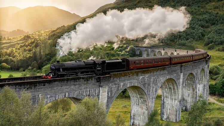 Image of steam train crossing the Glenfinnan viaduct in the Scottish Highlands