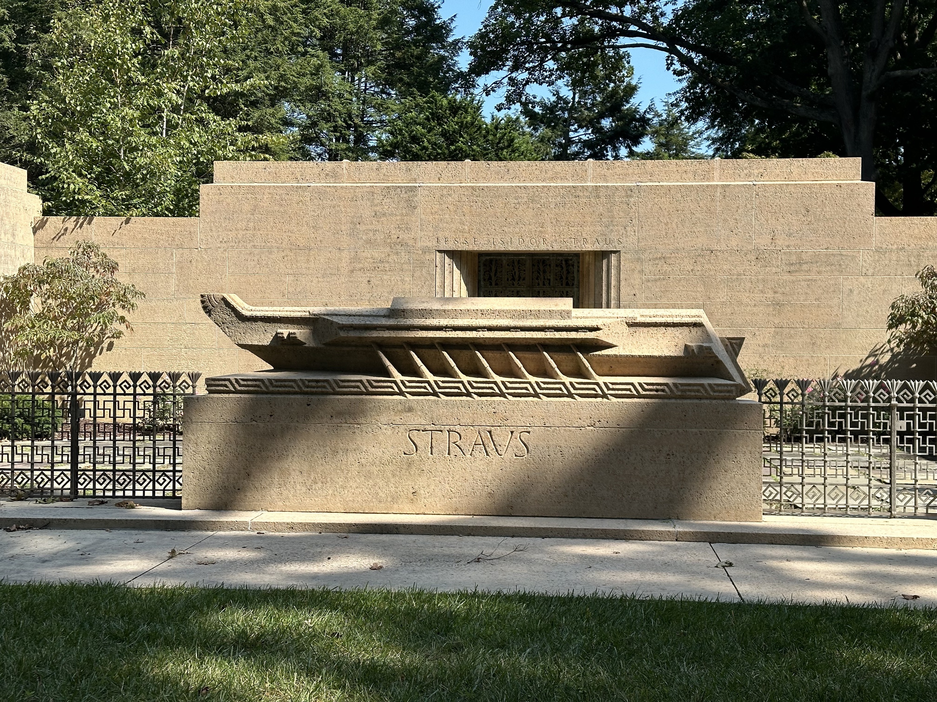 A gravestone with an Egyptian funeral boat.