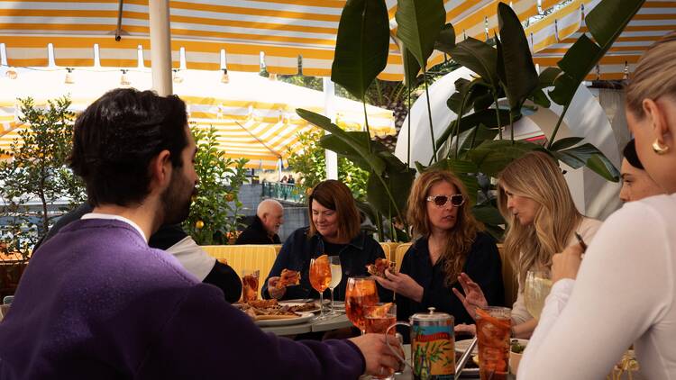 Glamorously dressed guests at Afloat Capri.