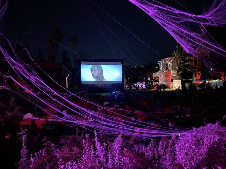 Watch a scary movie outdoors