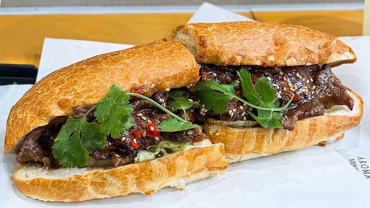 Yakiniku Beef Kalbi Roll on a paper-lined tray