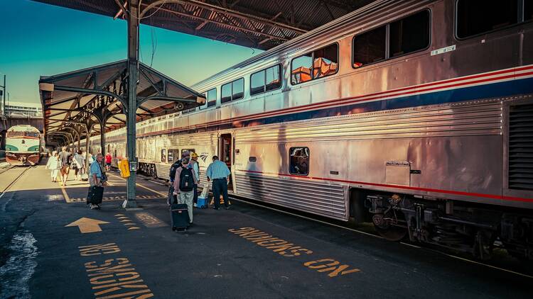 People boarding the Coast Starlight Amtrak train in Portland