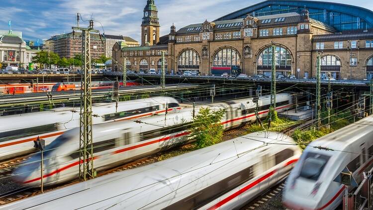 Hamburg train station with trains coming and going