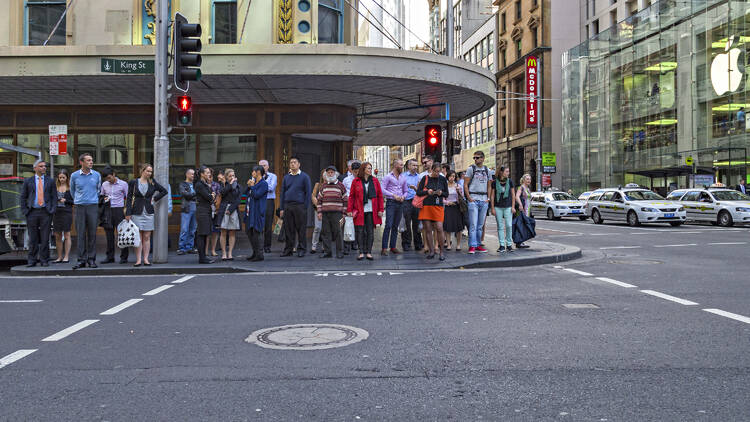 People waiting at crossing on George Street