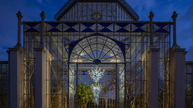 Glass floral sculpture in green house