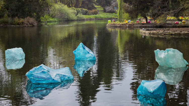 Glass ice berg sculptures in lake