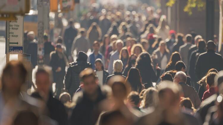 people in a crowded Manhattan street