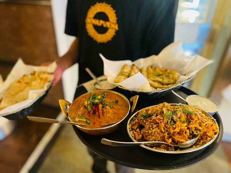 Spread of curries with naan