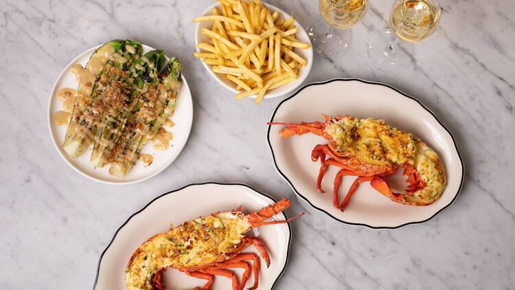 Lobsters with chips and cos salad