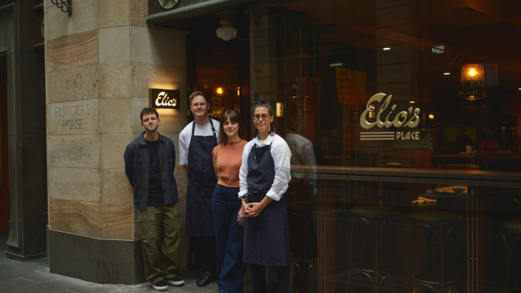 Staff standing in front of Elio's Place.