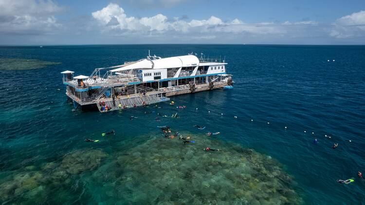 Aerial of the Reef Magic pontoon, Remora, on Moore Reef