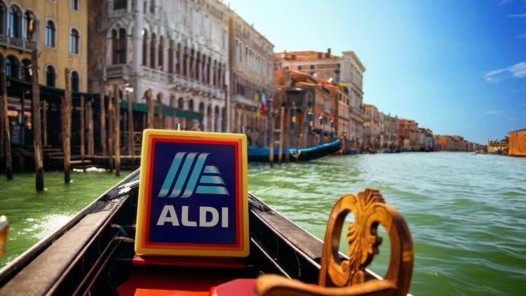 Aldi Holidays sign on European boat