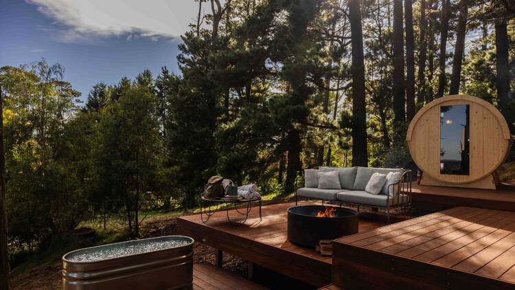 Forest bathing deck with fire pit, ice bath and sauna