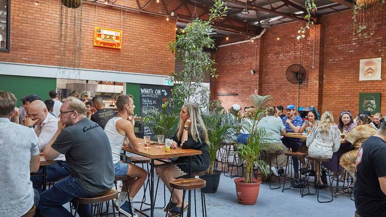 People drinking beer at Mixtape Brewing & Bar