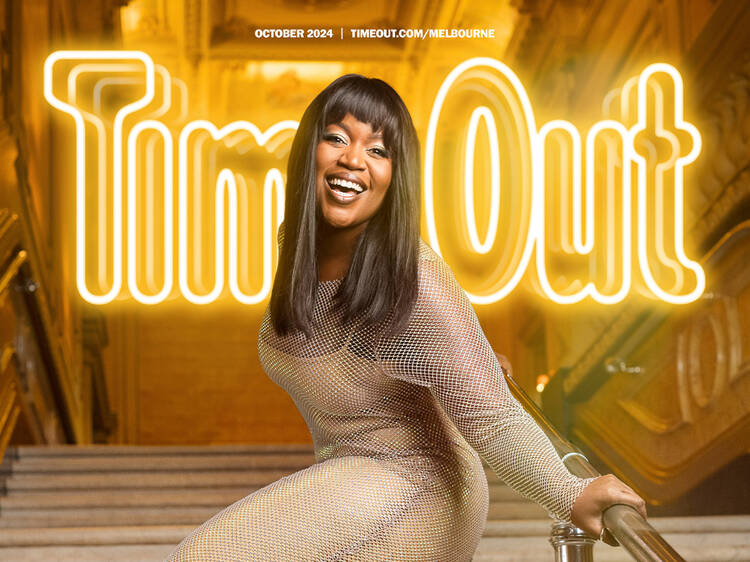 Ruva Ngwenya poses on the Princess Theatre grand staircase with a Time Out logo superimposed behind her