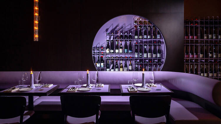 Purple dining room with a wine rack