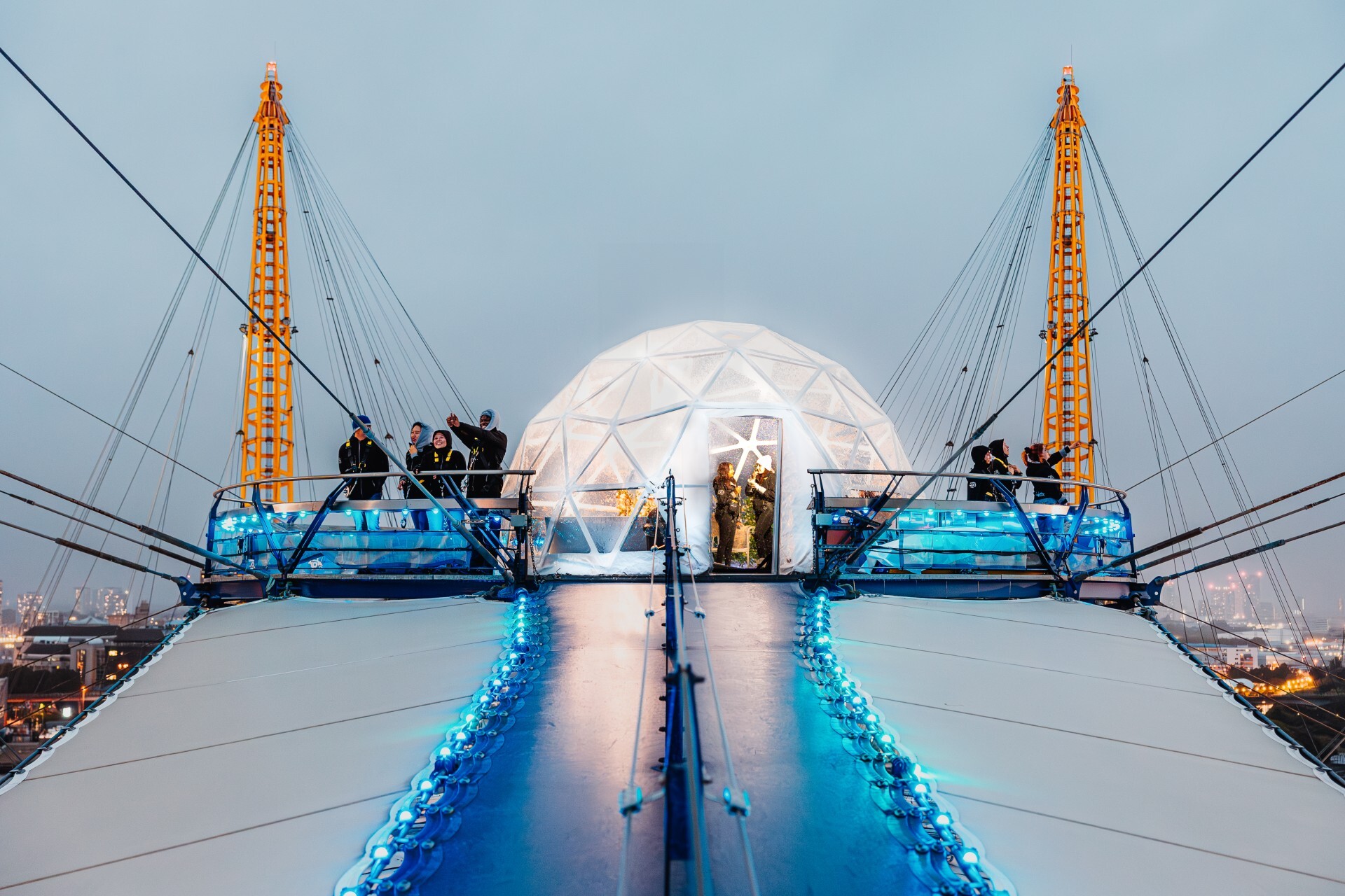 A giant snow globe is opening on top of the O2 Arena this Christmas